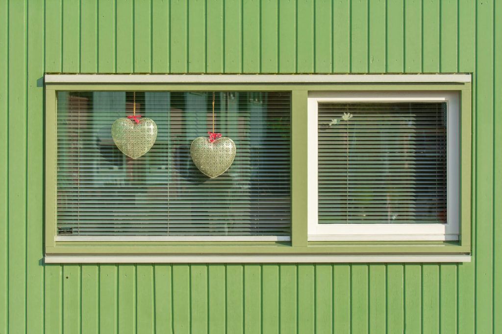 Heart Shaped Decorations Hanging behind a Window